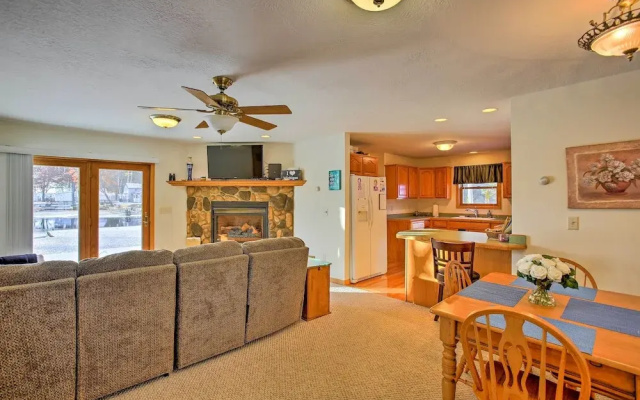 Cozy Riverfront Home w/ Fire Pit in Houghton Lake!