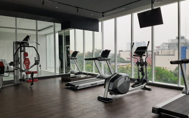 Elegant and Cozy 1BR Apartment at Bintaro Plaza Residence