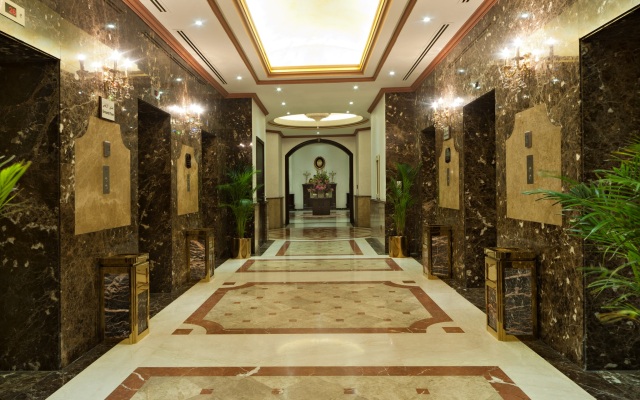 Magnum Hotel & Suites West Bay