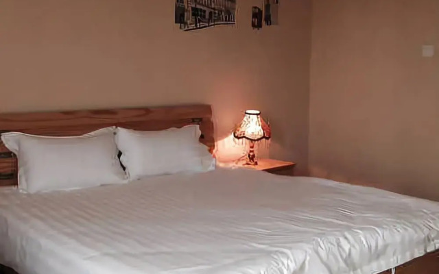 Yueming Holiday Apartment Hotel