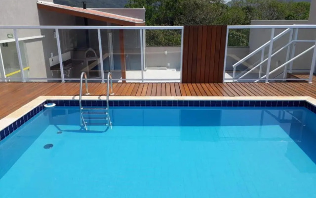Ubatuba - Apartamento com Churrasqueira e Piscina