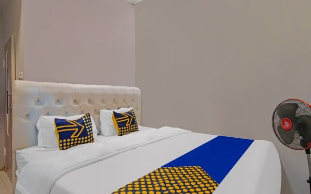 SPOT ON 92570 Putri Guest House Syariah Near SPBU Rimbo Panjang