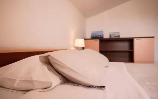 Apartment and Rooms Santini