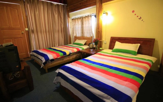 Lijiang Shuhe Shi Wu Wan Hostel