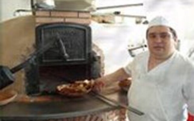 Asador H.M. Versus