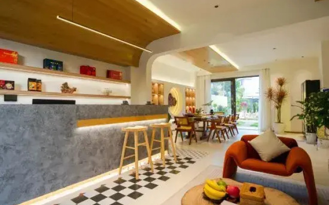 Mangshi Wanfeng Garden Villa Homestay (Dai Ancient Town Branch)
