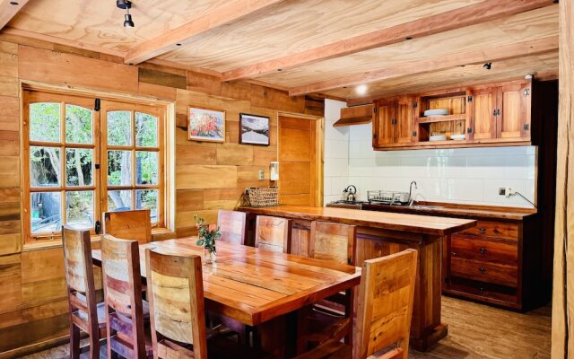 Cabañas entre montañas con tinajas calientes