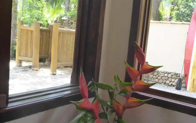 Mandacaru Chalés e Suítes