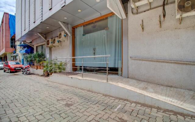 Collection O 75556 Hotel Address Inn