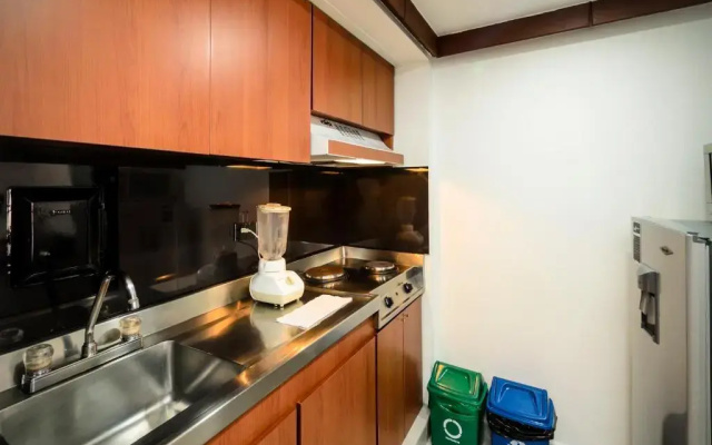 Travelers Suites Condominio Plenitud