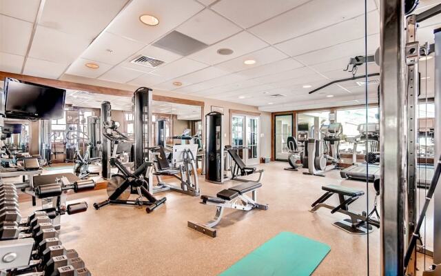 Expansive 4 Bedroom Ski in, Ski out One Ski Hill Residence Located at the Base of Peak 8 with Beautiful Views