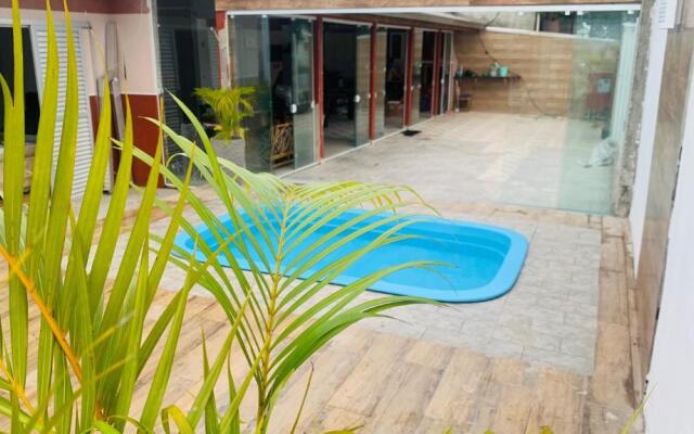 Casa c piscina matinhos S Etiene