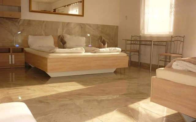 R1 Rolléder Apartman-ház