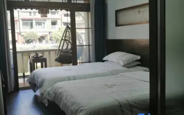 Xiongdi Renjia Diaojiaolou Inn