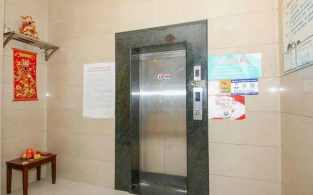 Paojiang Xinyuansu Business Hotel