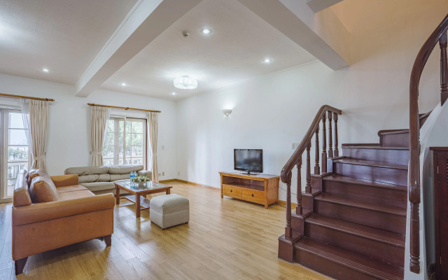 Coco Flower Village Serviced Apartment
