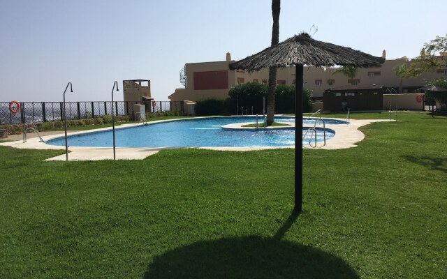 Penthouse sea views roof terrace communal pool