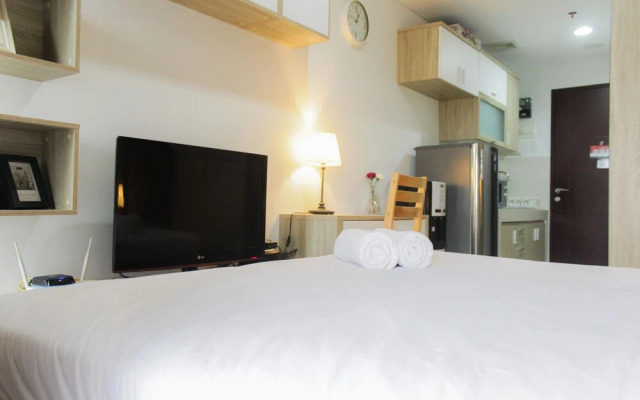 Bright Studio Apartment at Springwood Residence