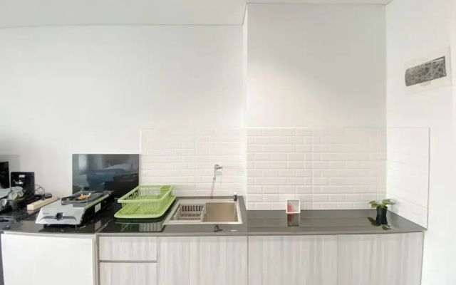 Simple White Designed Studio At Lrt City Bekasi Apartment