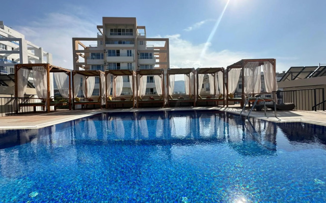 Olivia Palm Hotel