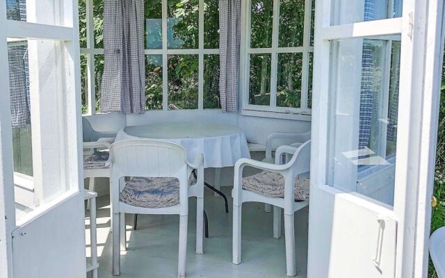 Cozy Holiday Home in Gudhjem near Golf Course