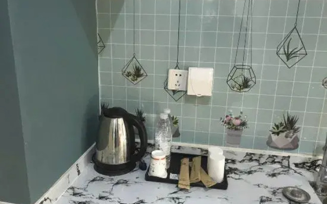 Home Huayi Hotel (Pingdu Renmin Road Branch