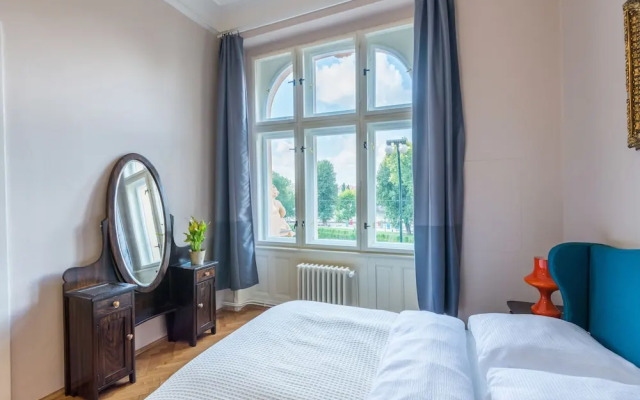 Riverside Apartment With A Balcony