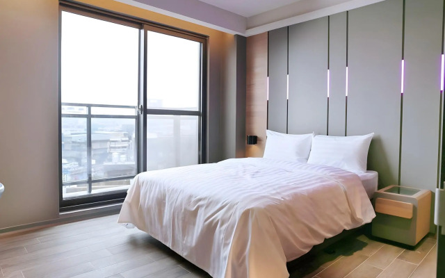 Kiwi Share Hotel - Zhongli Station Branch - Hostel