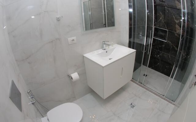 White Deluxe Apartments