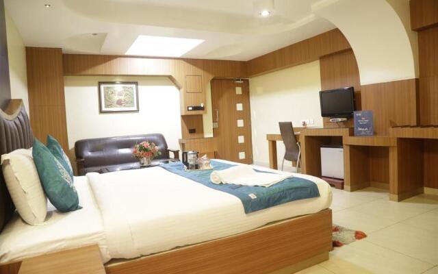 Capital O 1585 Hotel Palash Residency