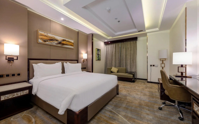 Al Ertiqaa Hotel