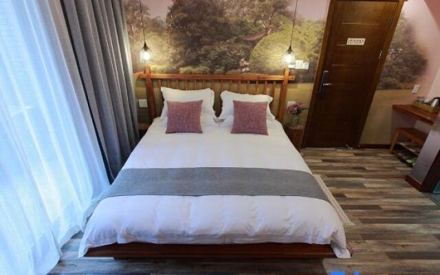 Zhangshe Courtyard Hotel