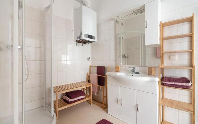 Colorful Apartment Facing Green Courtyard