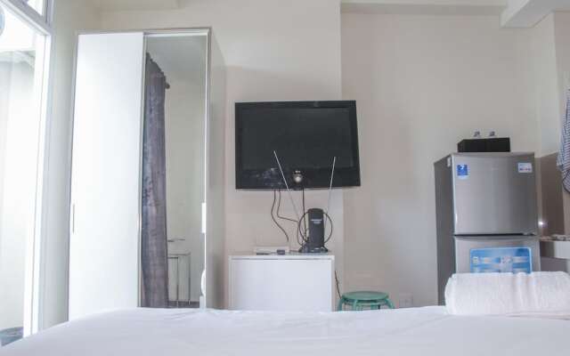 Homey Studio with City View Apartment @ Puri Orchard