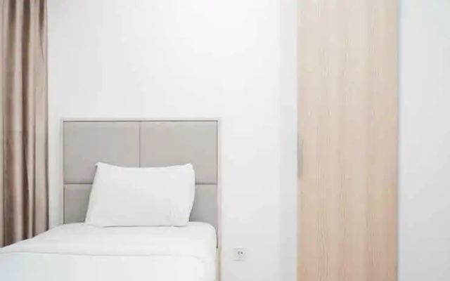 Cozy Living 2BR Apartment at M-Town Residence By Travelio