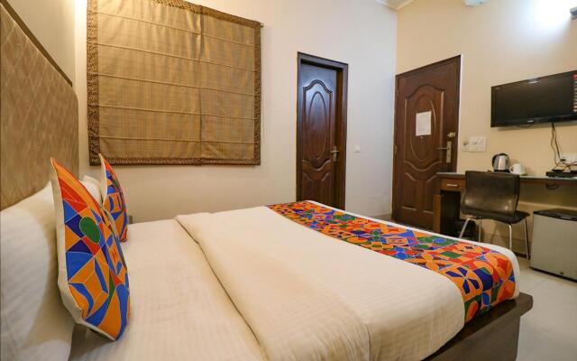 FabHotel Happy Residency