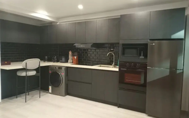 Hibiscus Suites And Residences