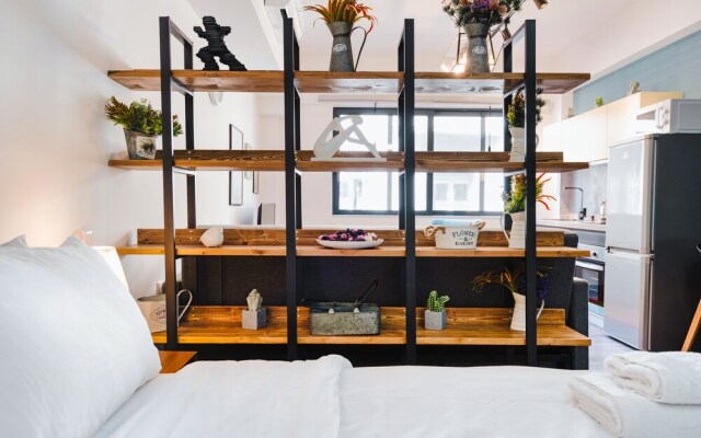 "sanders Home Suites - Pleasant Downtown Studio"