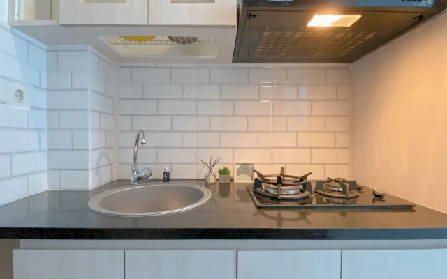 Comfy And Minimalist Studio Apartment At Tifolia