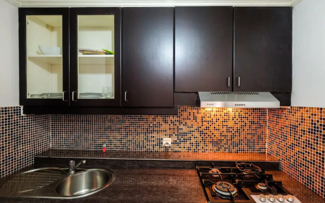 Elegant Minimalist 1BR Puri Imperium Apartment