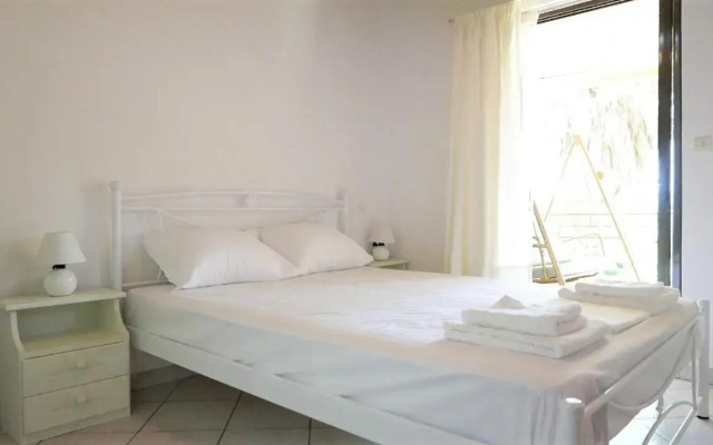 Amarynthos Beachfront Vacation House with garden