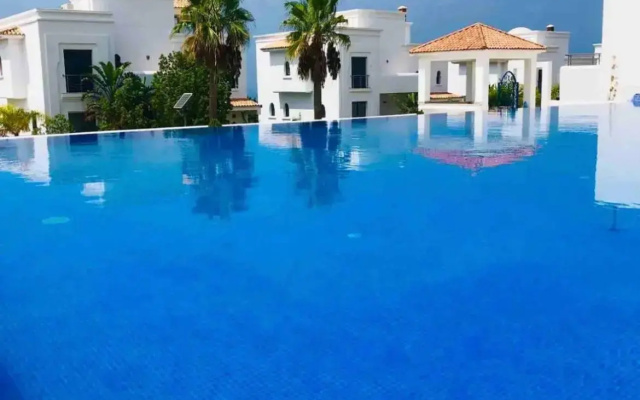 Un petit coin de paradis à Assilah+ piscine + WIFI