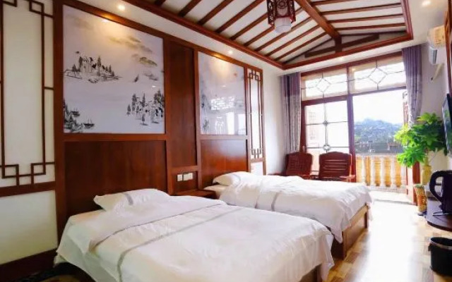 Xinyi Homeland Inn (Furong Town Waterfall Branch)