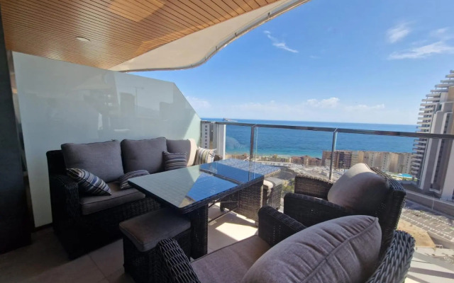 SUNSET WAVES vistas al mar