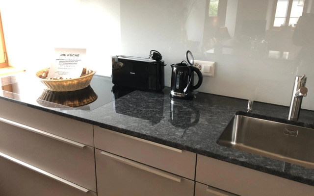 Dorf-Hotel "Apartments & Rooms"