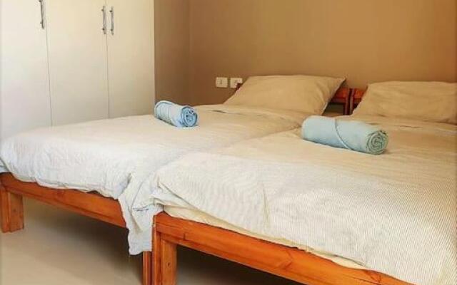 Tawila - Lovely 2-bedroom unit with shared pool