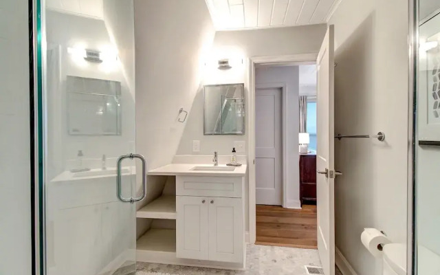 Roomy Chalet-Style Beachfront Condo with Private Beach Access by RedAwning