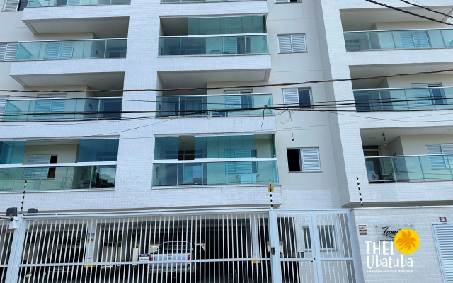 Apto completo e confortável com roupa de cama nas Toninhas  Condomínio Lumière