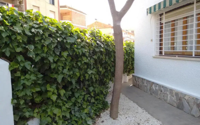 Chalet II con jardín y wifi en la playa