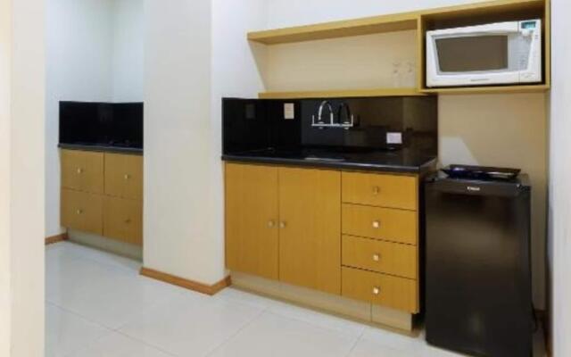 Le Village Flats e Hotel